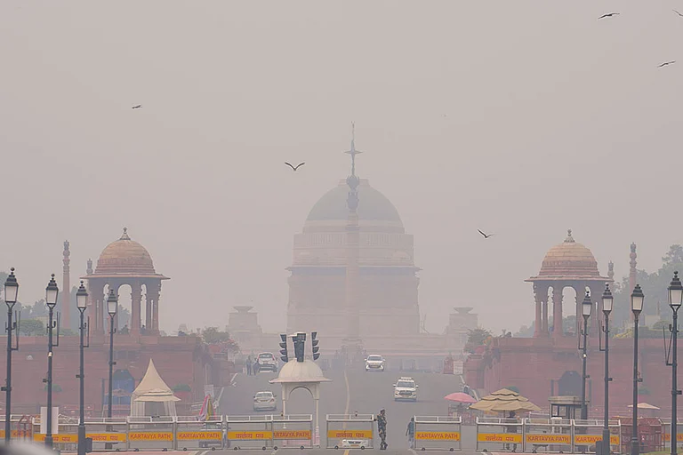 A layer of smog engulfs the Rashtrapati Bhavan after deterioration in the air quality in Delhi-NCR, in New Delhi. - | Photo: PTI/Kamal Kishore