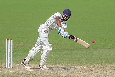 Gujarat's Jaymeet Patel plays a shot during the fourth day of the Ranji Trophy cricket match between Bengal and Gujarat, at Eden Gardens, in Kolkata.