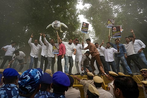 Members of Indian Youth Congress stage a protest against the Maharashtra’s Devendra Fadnavis-led Mahayuti government following the suspected death by suicide of a woman doctor in Satara district, in New Delhi.
