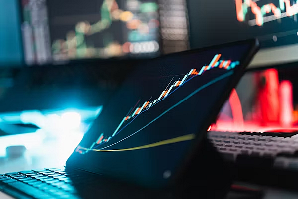 Laptop keyboard and graph visuals