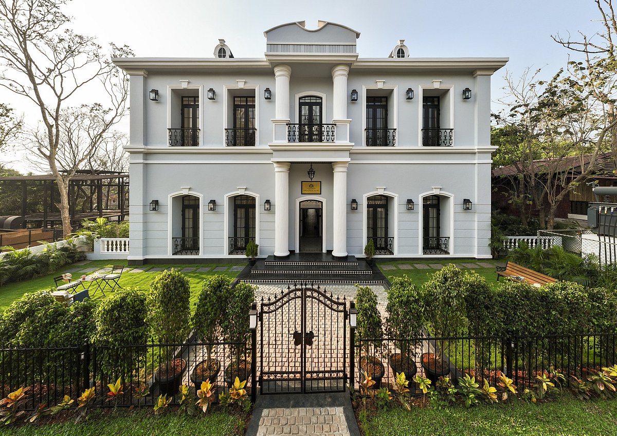 White mansion with garden