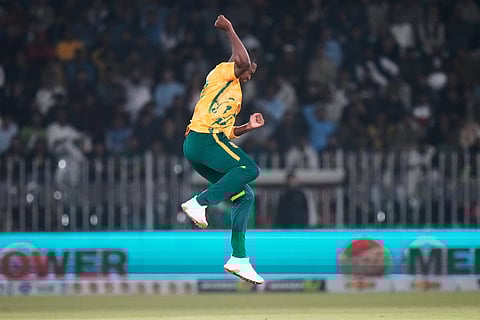 South Africa's Lungi Ngidi celebrates after taking the wicket of Pakistan's Hasan Nawaz during the first T20 cricket match between Pakistan and South Africa, in Rawalpindi, Pakistan.