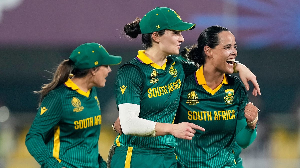 AP/Anupam Nath : South Africa's players celebrate after winning the ICC Women's Cricket World Cup first semifinal match against England.