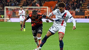 Desire Doue in action for Paris Saint-Germain against Lorient.
