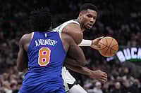 | Photo: AP/Morry Gash : Milwaukee Bucks' Giannis Antetokounmpo tries to get past New York Knicks' OG Anunoby during the second half of an NBA basketball game in Milwaukee. 