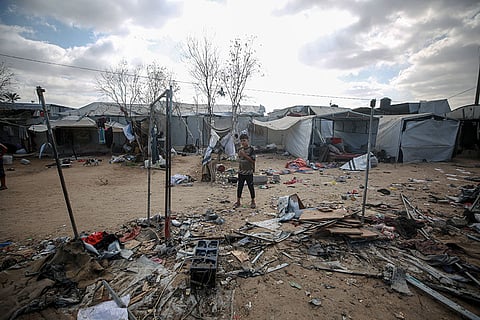 Displaced Palestinians inspect the damage after an Israeli army strike on their tent camp in Deir al-Balah, Gaza Strip Displaced Palestinians inspect the damage after an Israeli army strike on their tent camp in Deir al-Balah, Gaza Strip, Wednesday, Oct. 29, 2025.