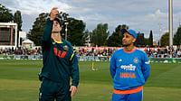 India Vs Australia 1st T20I Toss Update: AUS Opt To Bowl First – Check Playing XIs | Photo: X/BCCI : Australia's captain Mitchell Marsh and India's captain Suryakumar Yadav at the toss during the first T20I match at Manuka Oval, Canberra, on October 29, 2025.