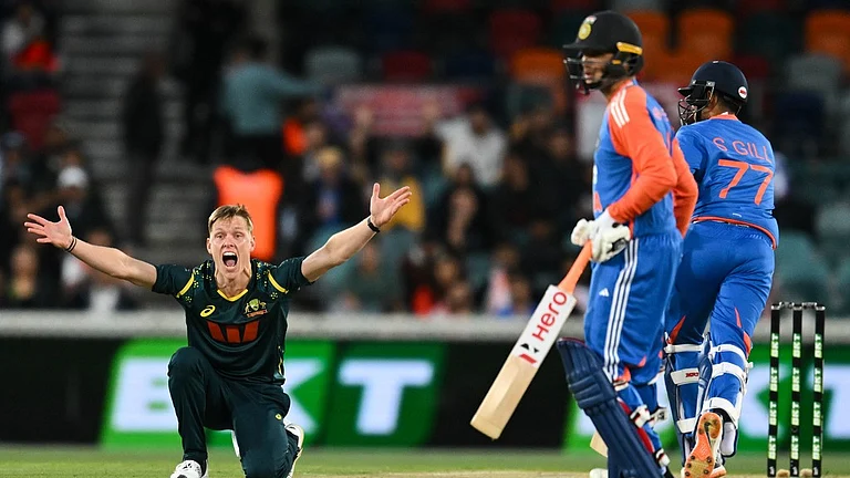 Nathan Ellis of Australia appeals unsuccessfully for the wicket of India's Shubman Gill during the first T20 international in Canberra. - Lukas Coch/AAPImage via AP