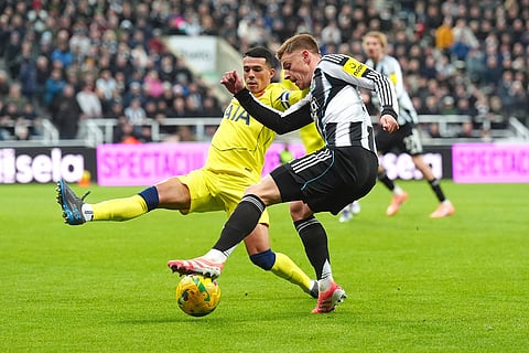 Newcastle vs Tottenham: Newcastle United's Harvey Barnes, right, and Tottenham Hotspur's Pedro Porro in action during the English League Cup fourth round soccer match between Newcastle United and Tottenham Hotspur in Newcastle, England.