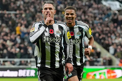 Newcastle vs Tottenham: Newcastle United's Fabian Schar, left, celebrates scoring during the English League Cup fourth round soccer match between Newcastle United and Tottenham Hotspur in Newcastle, England.