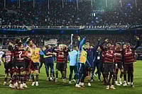 | Photo: AP/Rodrigo Abd : Players of Brazil's Flamengo celebrate winning a Copa Libertadores semifinal second leg soccer match against Argentina's Racing Club in Buenos Aires, Argentina.