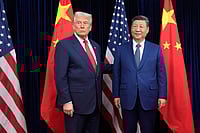 | Photo: AP/Mark Schiefelbein : South Korea China Trump Asia: US President Donald Trump, left, and Chinese President Xi Jinping pose ahead of their summit talk at Gimhae International Airport in Busan, South Korea.
