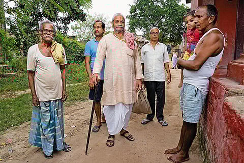 Political Clout: Members of the Brahmin village, Tiwaridih, including Tribhuvan Tiwari (centre)