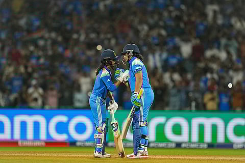 India's Jemimah Rodrigues and Richa Ghosh during an ICC Women's World Cup semifinal ODI cricket match between India Women and Australia Women, at the DY Patil Stadium, in Navi Mumbai.