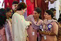 Priyanka Gandhi Vadra Pushes For On Long-Awaited Wayanad Churam Bypass Road | Photo: AICC via PTI : Priyanka Gandhi Vadra in Wayanad: Congress MP Priyanka Gandhi Vadra during the inauguration of the Kudumbasree annual celebration at Mini Stadium, Padinjarathara, in Wayanad, Kerala.