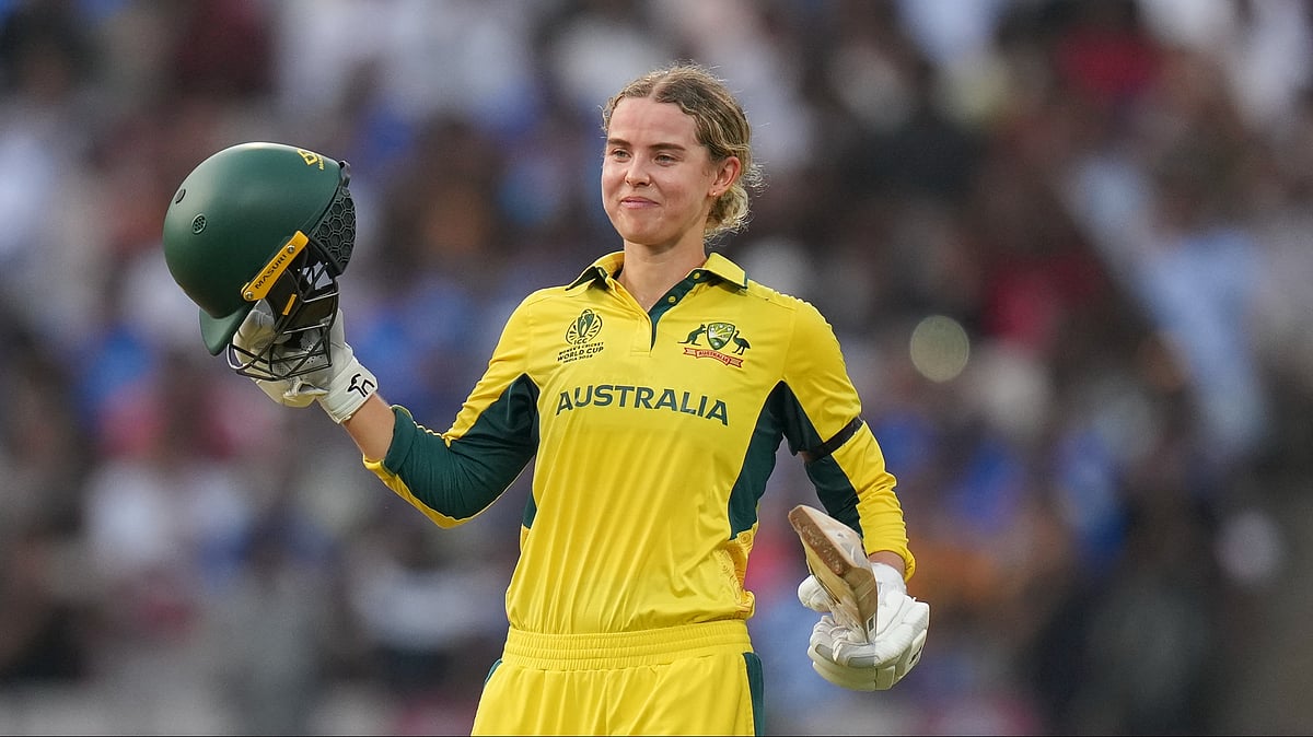 Kunal Patil/PTI : Australia's Phoebe Litchfield celebrates her century during an ICC Women's World Cup semifinal ODI cricket match between India Women and Australia Women, at the DY Patil Stadium.