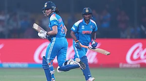 | Photo: AP/Ajit Solanki : India vs Australia Live Score, Today's Women's ODI Cricket World Cup 2nd Semi-Final Match live Updates: India's Smriti Mandhana, left, and Deepti Sharma run between the wickets during the ICC Women's Cricket World Cup match between India and England in Indore, India, Sunday, Oct. 19, 2025.