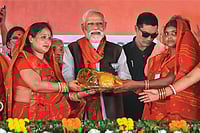 | Photo: PTI : Political Capital: Prime Minister Narendra Modi being felicitated at a public meeting in Begusarai district