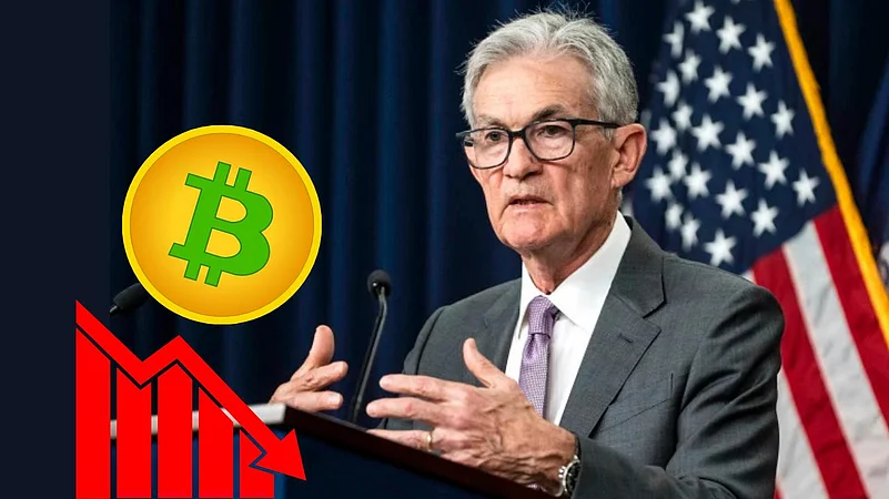 Cartoon of Jerome Powell with red arrow pointing down at Bitcoin