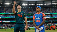 India Vs Australia 2nd T20I Toss Update: AUS Opt To Bowl First – Check Playing XIs | Photo: X/BCCI : Australia's captain Mitchell Marsh and India's captain Suryakumar Yadav during the toss of the second T20I at Melbourne Cricket Ground on October 31, 2025.