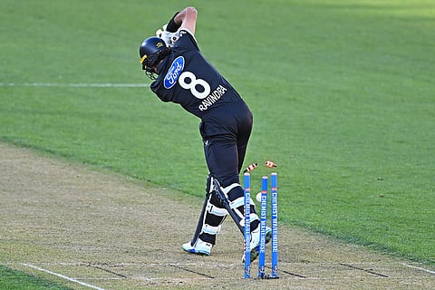 Rachin Ravindra of New Zealand is bowled by Sam Curran of England during the One Day International cricket match between New Zealand and England in Wellington, New Zealand.