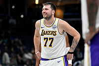 | Photo: AP/Brandon Dill : Los Angeles Lakers guard Luka Doncic (77) reacts in the second half of an NBA Cup basketball game against the Memphis Grizzlies in Memphis, Tenn.