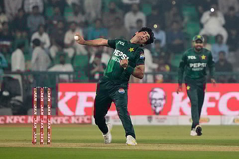 Pakistan's Naseem Shah bowls during the second T20 cricket match between Pakistan and South Africa, in Lahore, Pakistan.