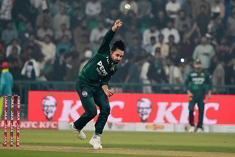 Pakistan's Faheem Ashraf bowls during the second T20 cricket match between Pakistan and South Africa, in Lahore, Pakistan.