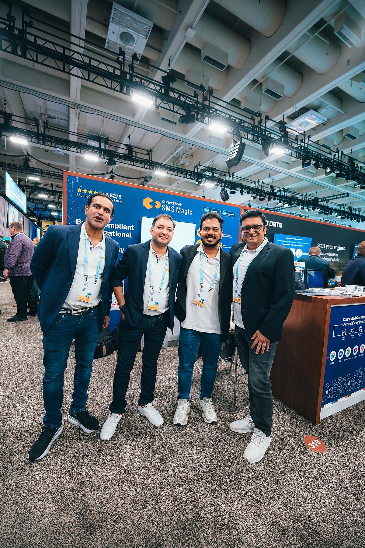 Four guys posing at an event