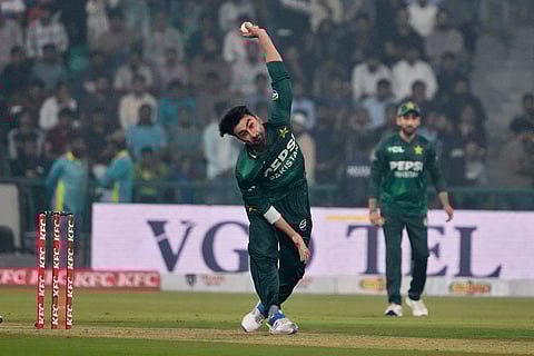 Pakistan's Salman Mirza bowls during the second T20 cricket match between Pakistan and South Africa, in Lahore, Pakistan.