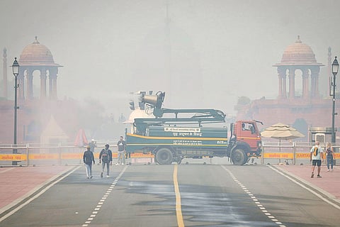 An anti-smog gun is being used to spray water droplets to curb air pollution, near Rashtrapati Bhavan, in New Delhi. Delhi's air quality remained in the 'poor' category on Saturday, with the overall AQI rising slightly to 251 from 218 the day before, Central Pollution Control Board (CPCB) data showed. 