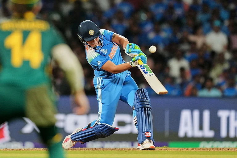 India's Richa Ghosh plays a shot during the ICC Women's Cricket World Cup final match between India and South Africa in Navi Mumbai. - | Photo: AP/Rafiq Maqbool