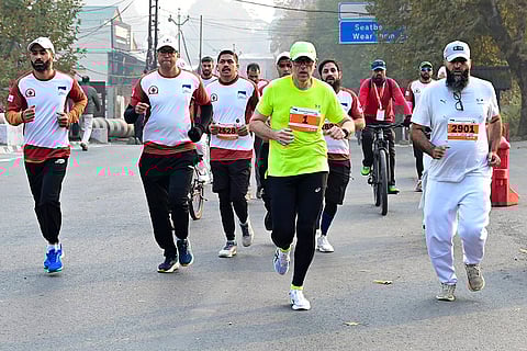 Jammu and Kashmir CM Omar Abdullah takes part in the second edition of the Kashmir Marathon 2025, in Srinagar. 