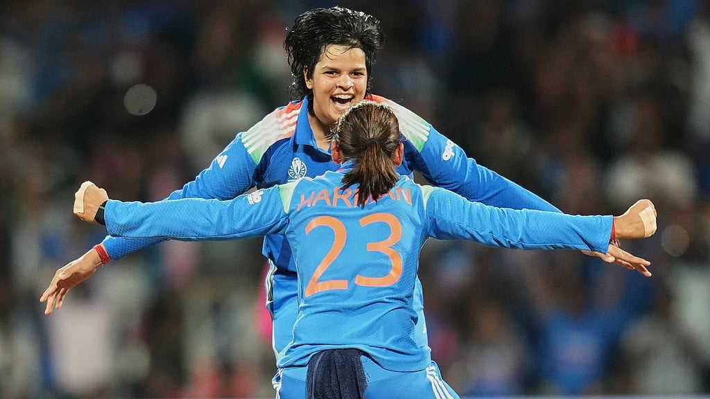 Captain Harmanpreet Kaur and Shafali Verma celebrate the dismissal of Sune Luus during the ICC Women's Cricket World Cup final between India and South Africa in Navi Mumbai. - Photo: AP