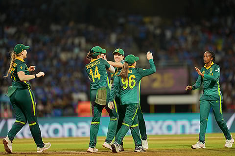 India's South Africa's players celebrate the dismissal of India's Jemimah Rodrigues during the ICC Women's Cricket World Cup final match between India and South Africa in Navi Mumbai.
