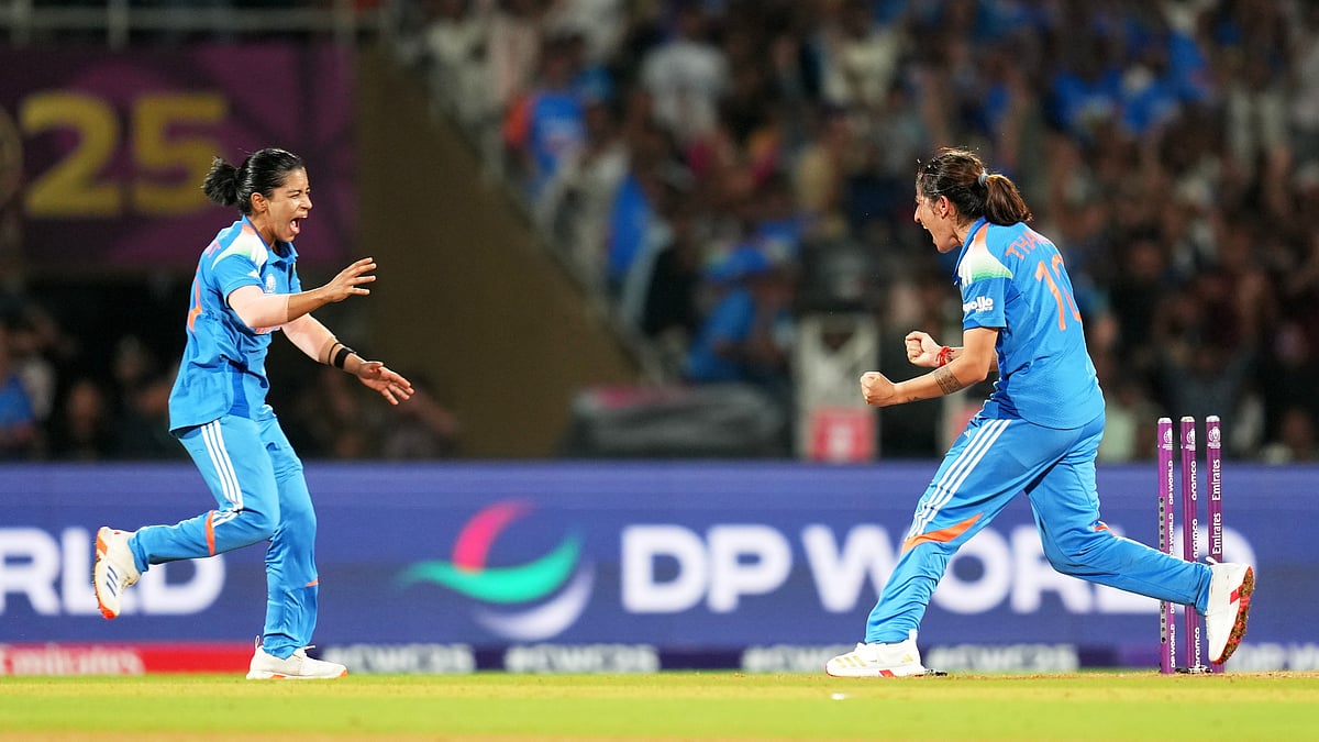 AP/Rafiq Maqbool : India's players celebrate the runout of South Africa's Tazmin Brits during the ICC Women's Cricket World Cup final.