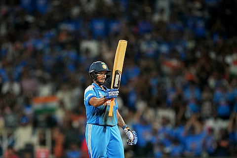 India's Deepti Sharma celebrates her fifty runs during the ICC Women's Cricket World Cup final match between India and South Africa in Navi Mumbai.