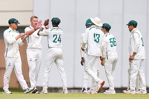 South Africa A's Tiaan van Vuuren with teammates celebrates after the wicket of India A's Ayush Badoni on the last day of the first unofficial test match of a series between India A and South Africa A, at BCCI Centre of Excellence, in Bengaluru, Karnataka.