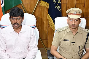 | Photo: PTI : DM Thiyagarajan S.M. (left) and SSP Kartikeya K. Sharma during a press conference after Mokama JD(U) candidate Anant Kumar Singh was arrested along with two associates, Manikant Thakur and Ranjit Ram, from Bedna village in connection with a serious election code violation, in Patna.