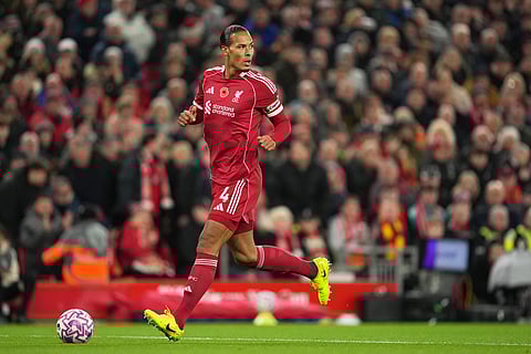 Liverpool's Virgil van Dijk in action during the English Premier League soccer match between Liverpool and Aston Villa in Liverpool, England.