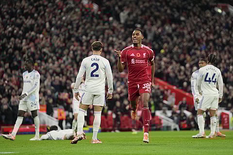 Liverpool's Ryan Gravenberch, centre, celebrates after scoring his side's second goal during the English Premier League soccer match between Liverpool and Aston Villa in Liverpool, England.