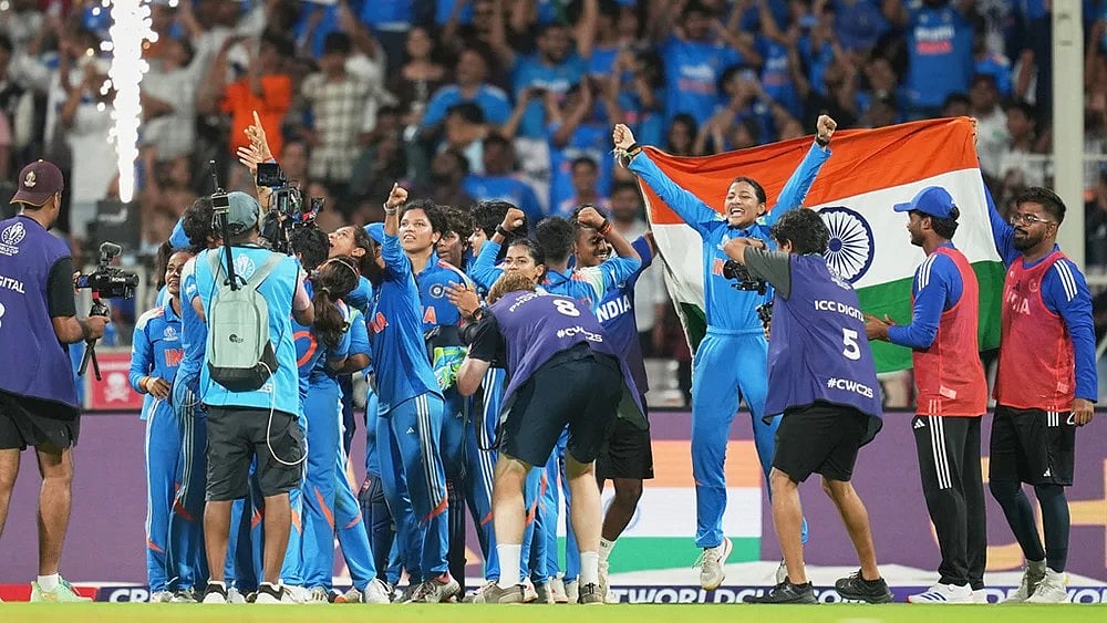 India's players celebrate after winning the ICC Women's Cricket World Cup final match between India and South Africa in Navi Mumbai. - | Photo: Rafiq Maqbool