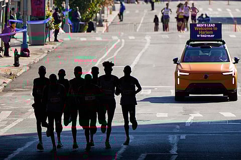 Runners in the men's elite division pass through the Bronx borough during the New York City Marathon in New York.