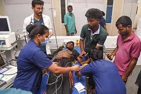 Injured receive medical treatment at a hospital after a tipper lorry carrying gravel collided head-on with a public transport bus, in Ranga Reddy district, Telangana.