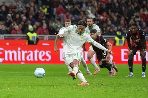 Roma's Paulo Dybala misses to score the penalty during the Serie A soccer match between AC Milan and Roma in Milan, Italy.