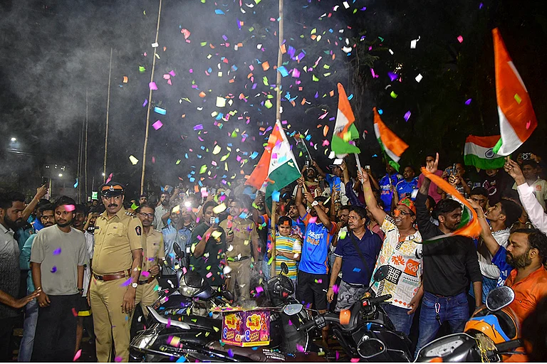People celebrate after the Indian cricket team won the ICC Women's World Cup 2025, at Dadar, in Mumbai, Maharashtra. - | Photo: PTI