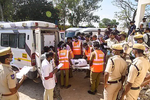 Ranga Reddy: Chevella municipality workers bring the mortal remains of a person who lost his life in a public transport bus accident, at Dr. Mahender Reddy General Hospital in Ranga Reddy district, Telangana. At least 19 people were killed and four others suffered injuries in the accident. 