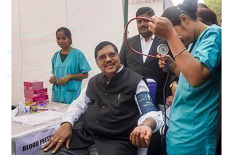 Chief Justice of India B.R. Gavai gets his blood pressure checked during a health check-up camp for staff and lawyers at the Supreme Court, in New Delhi.