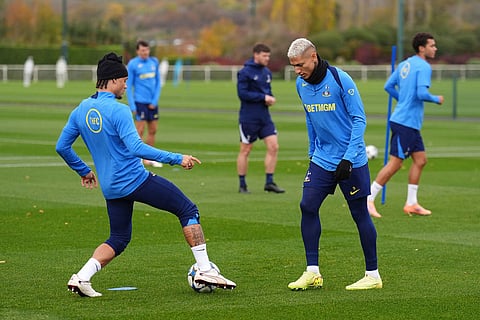 Tottenham Hotspur's Xavi Simons, left, and Richarlison during a training session in London, England, ahead of the Champions League soccer match against Copenhagen.