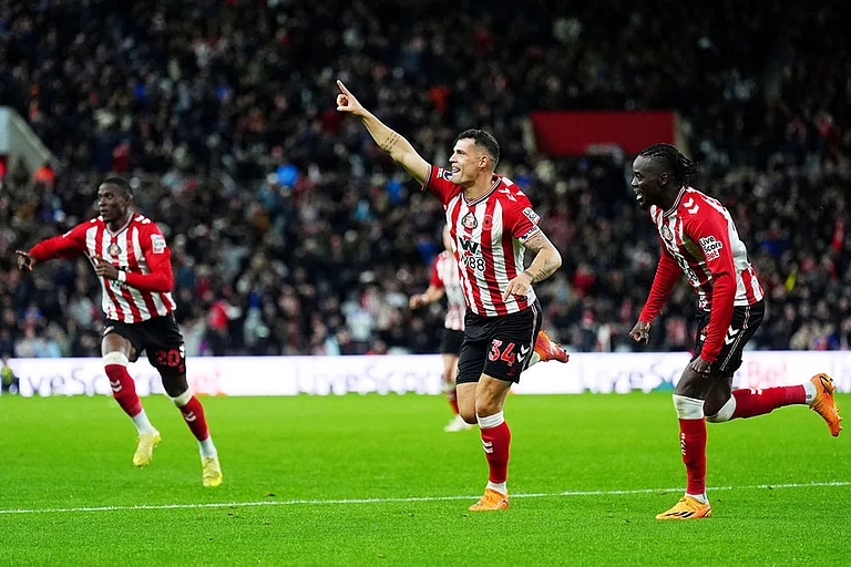 Sunderland's Granit Xhaka, center, celebrates scoring during the English Premier League soccer match between Sunderland and Everton in Sunderland, England. - | Photo: Owen Humphreys/PA via AP